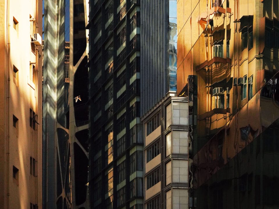 a shadowy photo of tall buildings