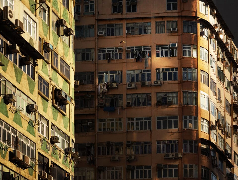 a shadowy photo of tall buildings
